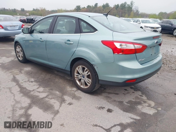 2012 Ford Focus SEL with VIN 1FAHP3H29CL430964, listed as a IAAI auction lot 42186057 with 122,279 mi miles. Bid and sale history available at carsss.com. Image 3.
