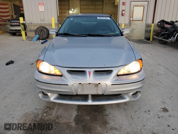 2001 Pontiac Grand Am GT with VIN 1G2NW52E11C245761, listed as a Copart auction lot 80585364 with 179,883 mi miles and Clean Title. Bid and sale history available at carsss.com. Image 5.