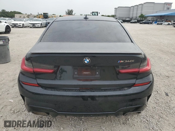 2020 BMW 3 Series M340i with VIN 3MW5U7J01L8B26649, listed as a Copart auction lot 62209814 with 49,731 mi miles and Salvage Title. Bid and sale history available at carsss.com. Image 6.