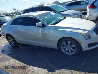 2014 Cadillac ATS Standard AWD with VIN 1G6AG5RX0E0101806, listed as a IAAI auction lot 41828755 with 114,857 mi miles and . Bid and sale history available at carsss.com. Image 12.