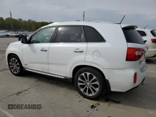 2014 Kia Sorento SX z VIN 5XYKWDA7XEG465848, wystawiony jako Copart lot #53256035 z przebiegiem 76 457 mil mil oraz Szkoda całkowita • Salvage title. Historia ofert i sprzedaży dostępna na DreamBid. Obrazek 2.