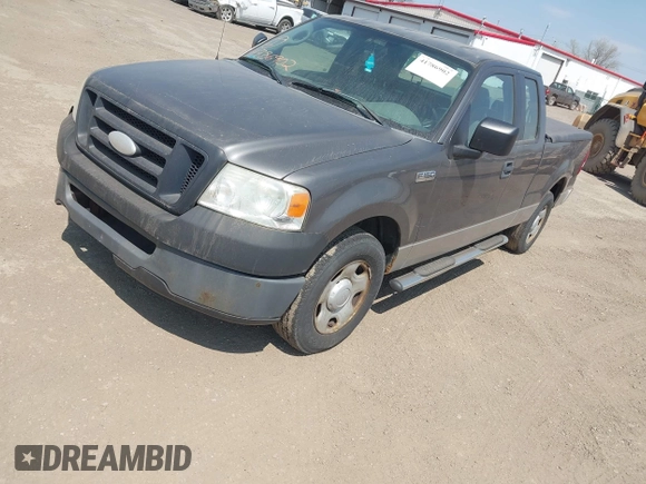 2007 Ford F-150 STX with VIN 1FTRX12W57FB45746, listed as a IAAI auction lot 41786902 with 242,405 mi miles and . Bid and sale history available at DreamBid. Image 2.