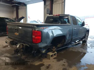 2014 Chevrolet Silverado 1500 LTZ with VIN 1GCVKSEJ2EZ312286, listed as a IAAI auction lot 41496345 with 76,747 mi miles and . Bid and sale history available at DreamBid. Image 4.