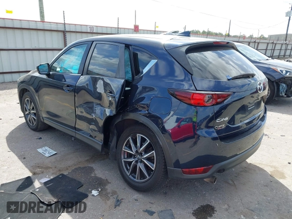 2018 Mazda CX-5 Touring with VIN JM3KFACM3J1370129, listed as a IAAI auction lot 41829027 with 71,305 mi miles. Bid and sale history available at carsss.com. Image 3.