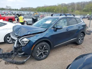 2023 Kia Sportage EX with VIN KNDPVCAGXP7104090, listed as a IAAI auction lot 42144158 with 26,983 mi miles and . Bid and sale history available at DreamBid. Image 2.
