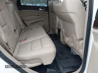 2014 Jeep Grand Cherokee Limited with VIN 1C4RJFBG7EC497622, listed as a IAAI auction lot 41667930 with 147,876 mi miles and . Bid and sale history available at DreamBid. Image 8.