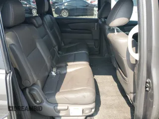 2013 Honda Odyssey Touring with VIN 5FNRL5H93DB017932, listed as a Copart auction lot 60112165 with 110,761 mi miles and Salvage title. Bid and sale history available at DreamBid. Image 11.