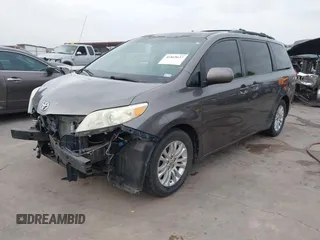2011 Toyota Sienna XLE AAS with VIN 5TDYK3DC1BS136012, listed as a IAAI auction lot 41869637 with 231,418 mi miles. Bid and sale history available at carsss.com. Image 2.