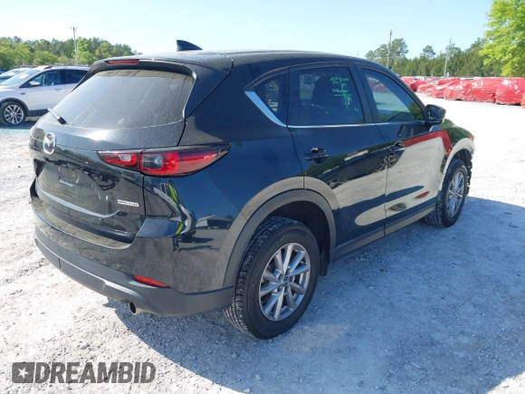 2023 Mazda CX-5 S Preferred with VIN JM3KFBCM7P0188244, listed as a IAAI auction lot 41969630 with 51,058 mi miles and . Bid and sale history available at carsss.com. Image 4.