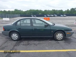 1998 Saturn SL с VIN 1G8ZH5280WZ295857, выставлен на аукционе IAAI как лот 42238789 с пробегом 153 163 миль миль и . История ставок и продаж доступна на DreamBid. Изображение 13.