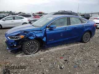 2017 Ford Fusion Hybrid Titanium with VIN 3FA6P0RU7HR301569, listed as a Copart auction lot 59375345 with 120,615 mi miles and Salvage title. Bid and sale history available at DreamBid. Image 1.