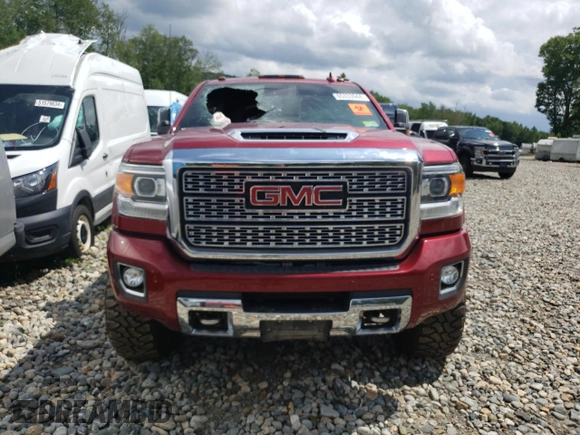 2019 GMC Sierra 3500HD Denali z VIN 1GT42WEY5KF258110, wystawiony jako Copart lot #65333944 z przebiegiem Nie podano mil oraz Szkoda całkowita • Salvage title. Historia ofert i sprzedaży dostępna na DreamBid. Obrazek 5.