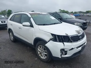 2015 Kia Sorento LX with VIN 5XYKTCA63FG586054, listed as a IAAI auction lot 42246543 with 159,427 mi miles and . Bid and sale history available at DreamBid. Image 1.