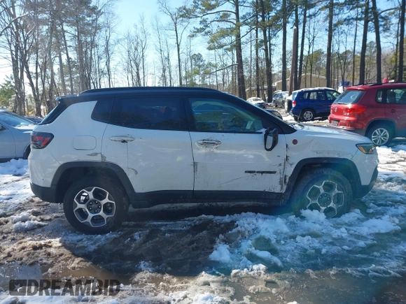 2022 Jeep Compass Trailhawk z VIN 3C4NJDDB6NT172792, wystawiony jako IAAI lot #41615557 z przebiegiem 12 191 mil mil oraz . Historia ofert i sprzedaży dostępna na DreamBid. Obrazek 13.