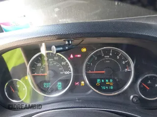 2014 Jeep Wrangler Unlimited Rubicon с VIN 1C4BJWFG2EL279938, выставлен на аукционе IAAI как лот 41920729 с пробегом 76 418 миль миль и . История ставок и продаж доступна на DreamBid. Изображение 7.
