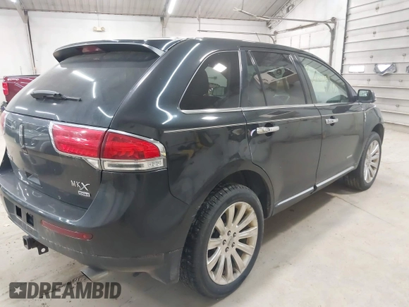 2014 Lincoln MKX with VIN 2LMDJ8JK4EBL16245, listed as a IAAI auction lot 42137824 with 184,479 mi miles. Bid and sale history available at carsss.com. Image 4.