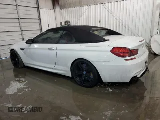 2016 BMW M6 z VIN WBS6G9C58GD932069, wystawiony jako Copart lot #55722063 z przebiegiem 61 793 mil mil oraz . Historia ofert i sprzedaży dostępna na DreamBid. Obrazek 2.