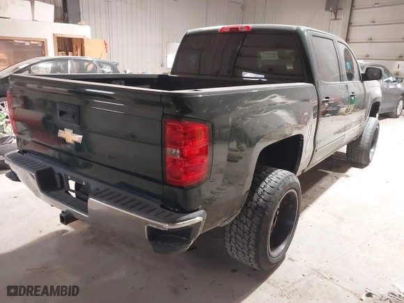 2015 Chevrolet Silverado 1500 LT with VIN 3GCUKREC4FG147784, listed as a IAAI auction lot 41501887 with 135,086 mi miles. Bid and sale history available at carsss.com. Image 4.