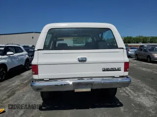 1990 Chevrolet Blazer z VIN 1GNEV18K5LF144221, wystawiony jako Copart lot #52296175 z przebiegiem 114 593 mil mil oraz Szkoda całkowita • Salvage title. Historia ofert i sprzedaży dostępna na DreamBid. Obrazek 6.