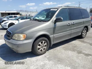 2005 Kia Sedona LX with VIN KNDUP132956661322, listed as a Copart auction lot 71431874 with 101,875 mi miles and Salvage Title. Bid and sale history available at carsss.com. Image 1.