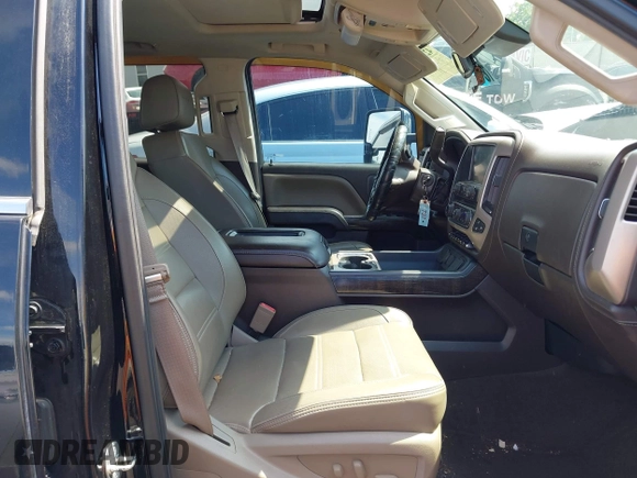 2016 GMC Sierra 2500HD Denali z VIN 1GT12UE84GF259750, wystawiony jako IAAI lot #42221632 z przebiegiem 201 055 mil mil oraz . Historia ofert i sprzedaży dostępna na DreamBid. Obrazek 5.
