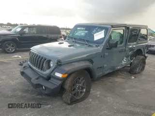2024 Jeep Wrangler Sport S with VIN 1C4PJXDN8RW370133, listed as a IAAI auction lot 42453029 with 10,415 mi miles and . Bid and sale history available at DreamBid. Image 2.