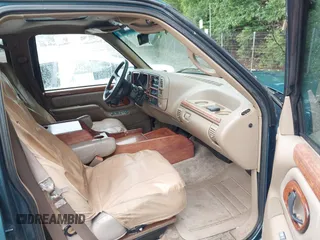 1995 GMC Suburban with VIN 1GDFK16K8SJ741041, listed as a IAAI auction lot 42315676 with 159,312 mi miles and . Bid and sale history available at DreamBid. Image 5.
