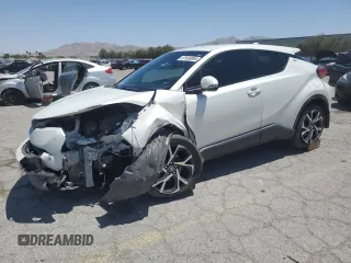 2018 Toyota C-HR XLE z VIN NMTKHMBX5JR042017, wystawiony jako Copart lot #57630085 z przebiegiem 36 614 mil mil oraz Szkoda całkowita • Salvage title. Historia ofert i sprzedaży dostępna na DreamBid. Obrazek 1.