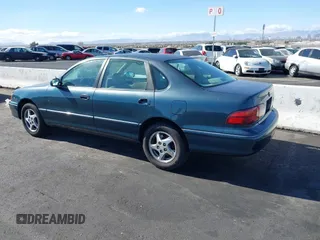 1998 Toyota Avalon XL with VIN 4T1BF18BXWU267131, listed as a IAAI auction lot 41518513 with 208,023 mi miles and . Bid and sale history available at DreamBid. Image 3.