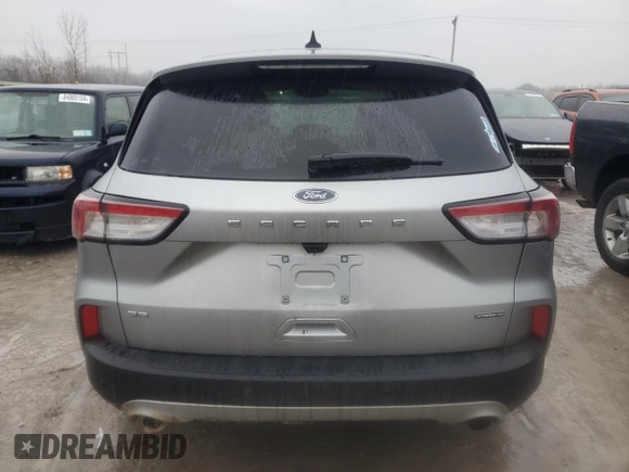 2021 Ford Escape SE Hybrid with VIN 1FMCU9BZ0MUA04027, listed as a Copart auction lot 83825274 with 97,068 mi miles and Salvage title. Bid and sale history available at DreamBid. Image 6.