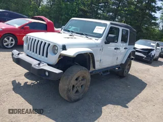 2018 Jeep Wrangler Unlimited Sport S with VIN 1C4HJXDGXJW146873, listed as a IAAI auction lot 42404813 with 73,929 mi miles and . Bid and sale history available at DreamBid. Image 18.