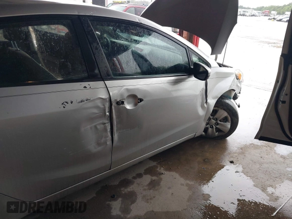2014 Kia Forte LX with VIN KNAFK4A67E5059911, listed as a IAAI auction lot 42105858 with 183,067 mi miles. Bid and sale history available at carsss.com. Image 6.