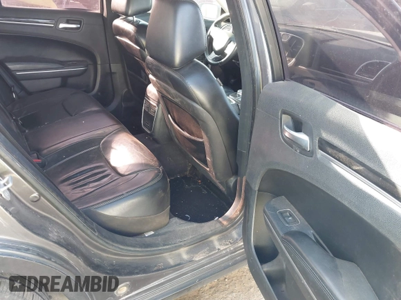 2016 Chrysler 300 Anniversary Edition with VIN 2C3CCAAG0GH206645, listed as a IAAI auction lot 41739990 with 154,516 mi miles and . Bid and sale history available at DreamBid. Image 8.