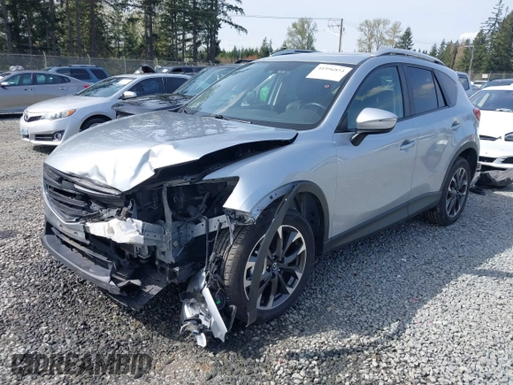 2016 Mazda CX-5 Grand Touring with VIN JM3KE4DYXG0647802, listed as a IAAI auction lot 41996854 with 85,774 mi miles. Bid and sale history available at carsss.com. Image 17.
