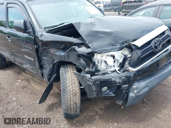 2015 Toyota Tacoma z VIN 3TMLU4EN1FM203143, wystawiony jako IAAI lot #42445912 z przebiegiem 57 444 mil mil oraz . Historia ofert i sprzedaży dostępna na DreamBid. Obrazek 6.