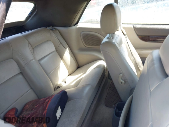 2004 Chrysler Sebring Limited z VIN 1C3EL65R74N171865, wystawiony jako IAAI lot #41996305 z przebiegiem 151 613 mil mil oraz . Historia ofert i sprzedaży dostępna na DreamBid. Obrazek 8.