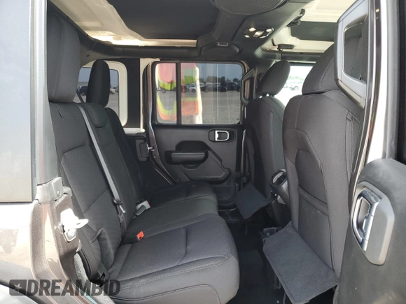 2023 Jeep Wrangler Willys with VIN 1C4HJXDGXPW526093, listed as a Copart auction lot 56818935 with 24,021 mi miles and Salvage title. Bid and sale history available at DreamBid. Image 10.