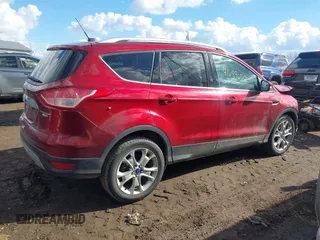 2015 Ford Escape Titanium with VIN 1FMCU9J91FUA97855, listed as a IAAI auction lot 41689650 with 125,487 mi miles. Bid and sale history available at carsss.com. Image 13.