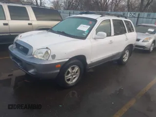 2003 Hyundai Santa Fe GLS with VIN KM8SC73D53U346562, listed as a IAAI auction lot 41706515 with 192,883 mi miles. Bid and sale history available at carsss.com. Image 2.