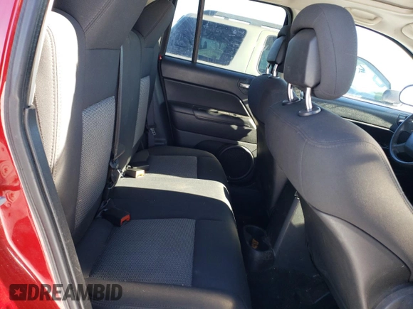 2010 Jeep Compass Sport with VIN 1J4NF4FB2AD525117, listed as a Copart auction lot 79426624 with 149,152 mi miles and Salvage Title. Bid and sale history available at carsss.com. Image 11.