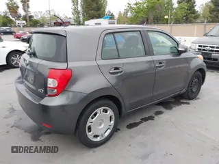 2010 Scion xD with VIN JTKKU4B44A1003993, listed as a IAAI auction lot 42120495 with 71,118 mi miles. Bid and sale history available at carsss.com. Image 4.