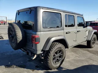 2020 Jeep Wrangler Unlimited Willys with VIN 1C4HJXDG5LW348507, listed as a Copart auction lot 77000574 with 57,056 mi miles and Salvage title. Bid and sale history available at DreamBid. Image 3.