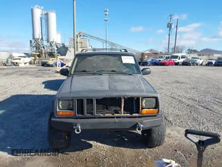 2001 Jeep Cherokee Sport with VIN 1J4FF58S41L619254, listed as a IAAI auction lot 41596384 with 180,826 mi miles and . Bid and sale history available at DreamBid. Image 12.