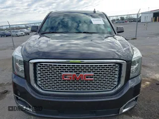 2017 GMC Yukon Denali with VIN 1GKS1CKJ0HR153941, listed as a IAAI auction lot 41300648 with 128,193 mi miles. Bid and sale history available at carsss.com. Image 12.