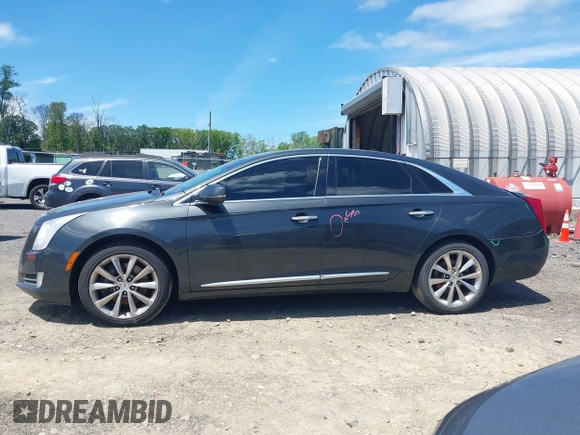2013 Cadillac XTS Luxury z VIN 2G61R5S33D9101434, wystawiony jako IAAI lot #42290199 z przebiegiem 48 075 mil mil oraz . Historia ofert i sprzedaży dostępna na DreamBid. Obrazek 14.