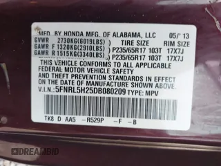 2013 Honda Odyssey LX with VIN 5FNRL5H25DB080209, listed as a IAAI auction lot 42123644 with 157,631 mi miles and . Bid and sale history available at carsss.com. Image 9.