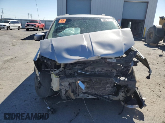 2014 Dodge Grand Caravan SXT with VIN 2C4RDGCG4ER478657, listed as a Copart auction lot 55691085 with 139,681 mi miles and Salvage Title. Bid and sale history available at DreamBid. Image 5.