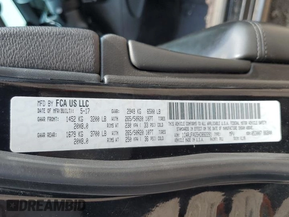 2017 Jeep Grand Cherokee Altitude with VIN 1C4RJFAG5HC892291, listed as a Copart auction lot 58579975 with 71,018 mi miles and Salvage title. Bid and sale history available at DreamBid. Image 13.