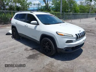 2016 Jeep Cherokee Latitude with VIN 1C4PJLCS1GW108435, listed as a IAAI auction lot 42391923 with 171,476 mi miles and . Bid and sale history available at DreamBid. Image 1.