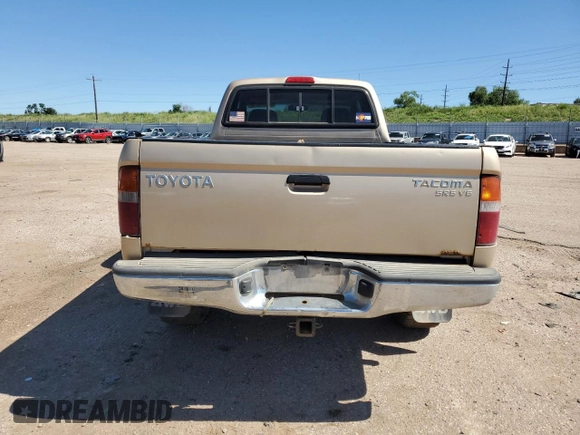 1999 Toyota Tacoma with VIN 4TAWN72N4XZ560411, listed as a Copart auction lot 61499925 with 395,215 mi miles and Salvage title. Bid and sale history available at DreamBid. Image 6.
